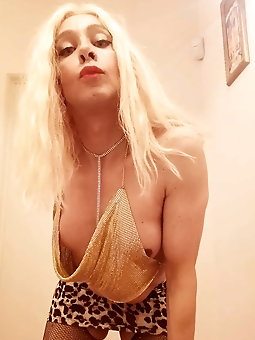 Camelia TS whore in golden sexy top