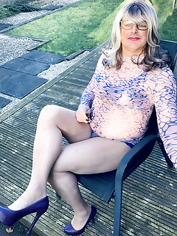 Crossdresser Kellycd in blue and pink see thru dress